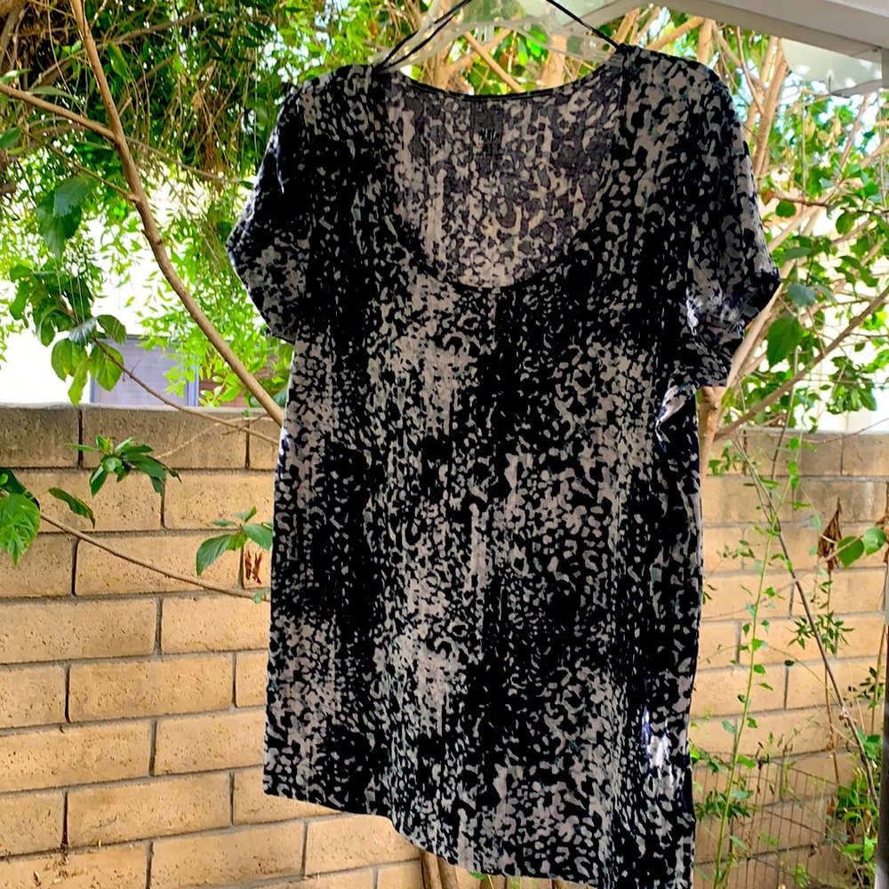 Blouse. Navy blue and cream with dashes of teal.